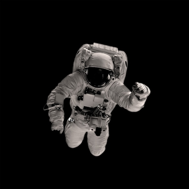 Astronaut on the black backgrounds. Elements of this image furnished by NASA