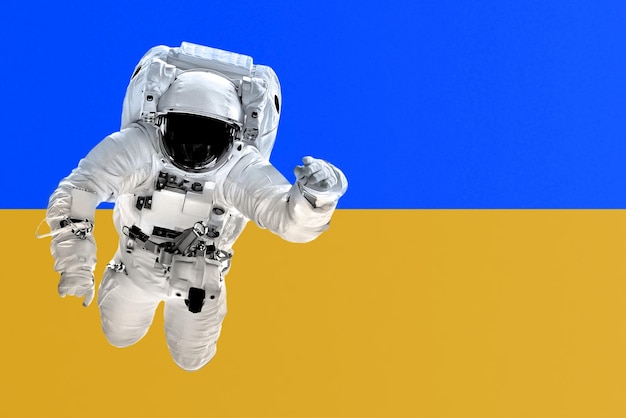 Astronaut flies over colorful flag of Ukraine