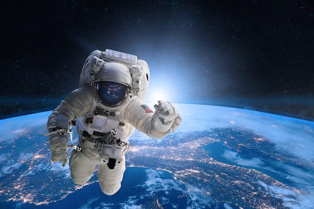 Astronaut in outer space on of the Earth