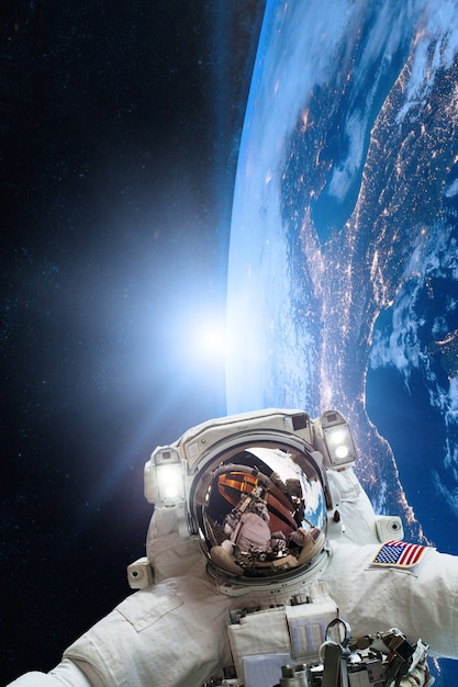 Astronaut in outer space on of the Earth