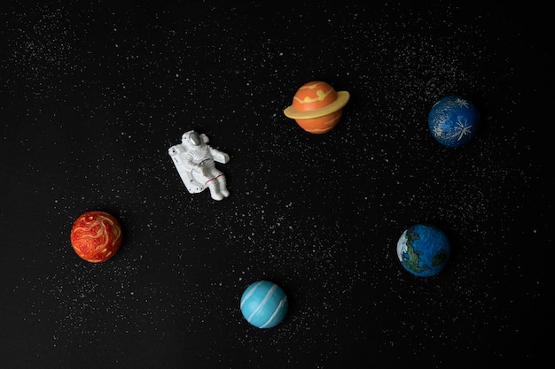 Photo astronaut and planets on space background