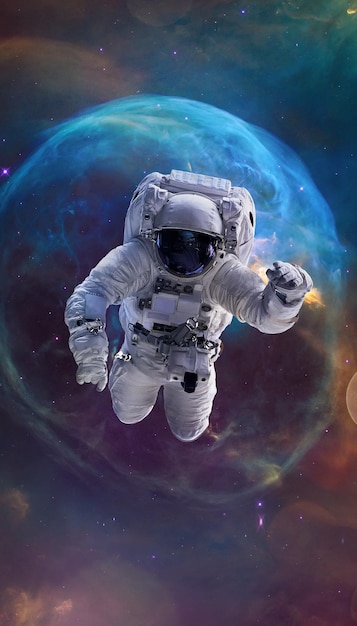 astronaut in space vertical galaxy and nebula space art elements of this image furnished by nasa