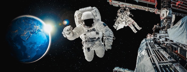 Astronaut spaceman do spacewalk while working for space station