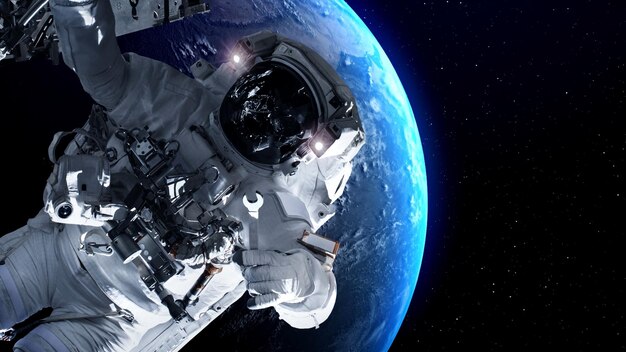 Astronaut spaceman do spacewalk while working for spaceflight mission