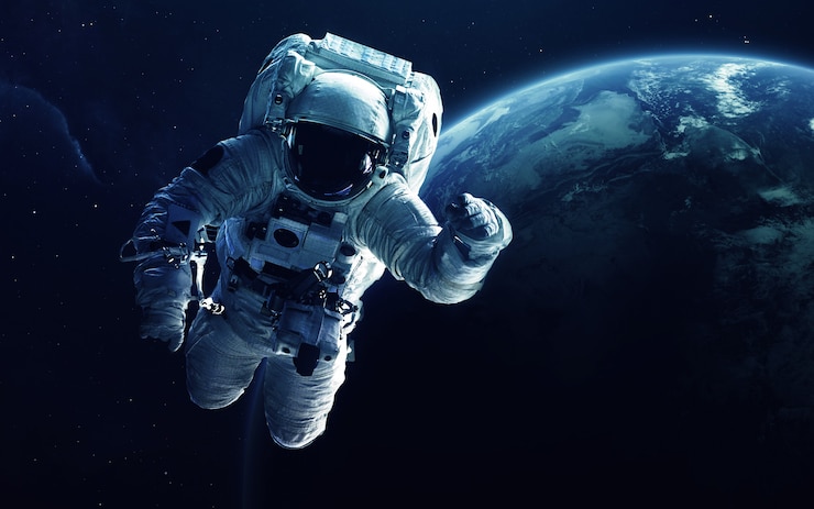 Foto astronaut voor de planeet aarde.