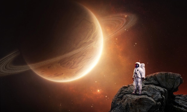 Astronauts planets deep space landscape in light of orange star fantasy  3D rendering