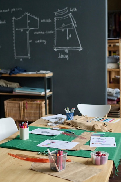 Atelier with sewing patterns on blackboard