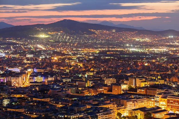 Athens aerial panoramic view from the Mount Lycabettus in Athens, Greece at night