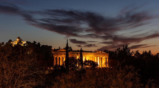 Athens Greece Hephaestus temple and old national observatory illuminated at night