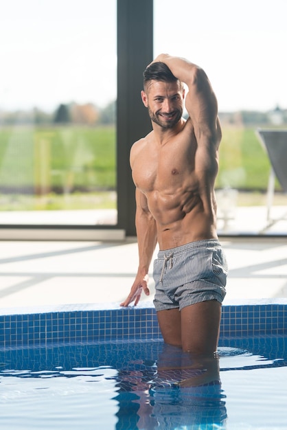 Athlete at hotel indoor pool