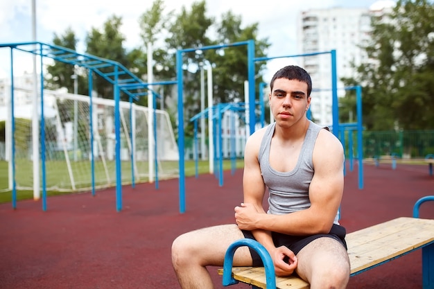 Athlete relax on the bench