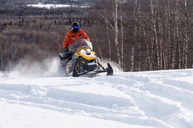 Athlete on a snowmobile