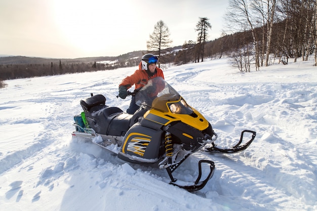 Athlete on a snowmobile