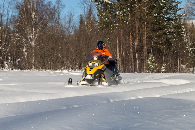 Athlete on a snowmobile