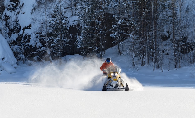 Athlete on a snowmobile