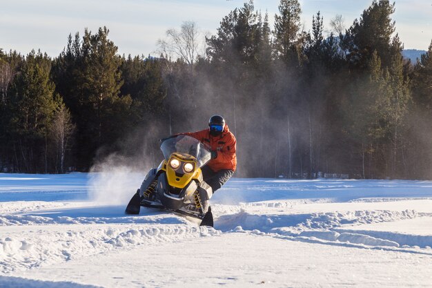 Athlete on a snowmobile