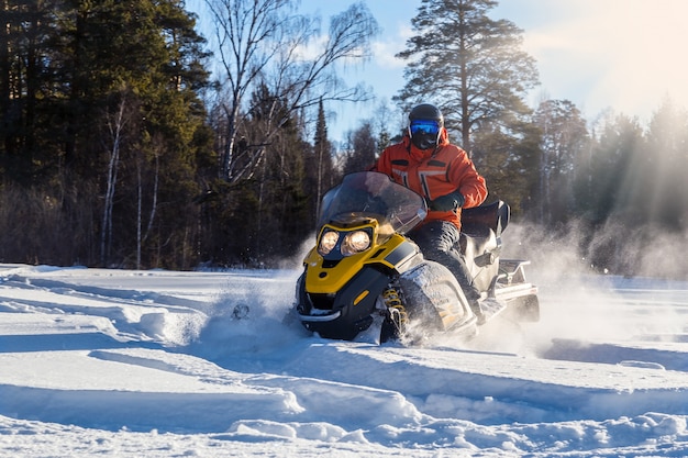 Athlete on a snowmobile