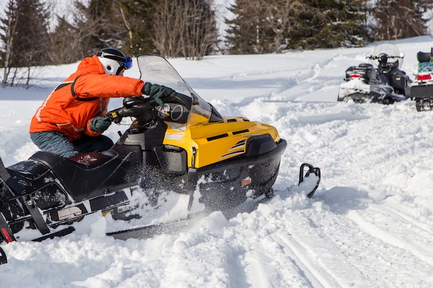 Athlete on a snowmobile