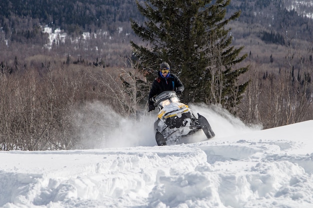 Athlete on a snowmobile