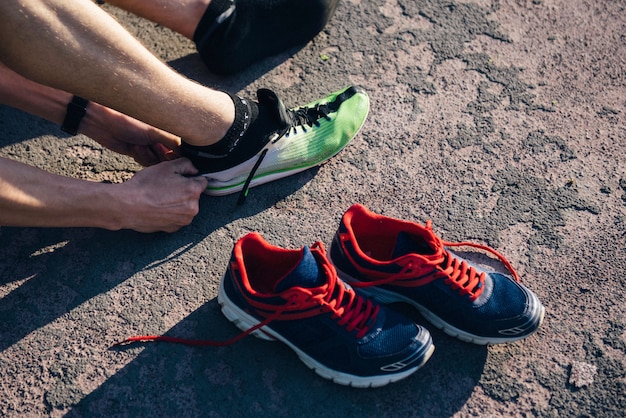 Photo athlete in the stadium shoes running shoes