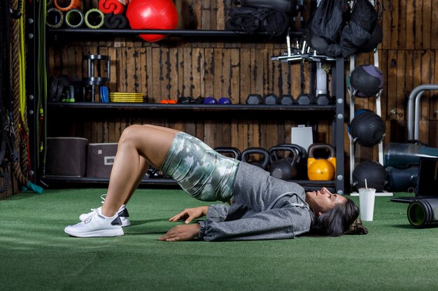 athlete woman stretching after giving online exercise class