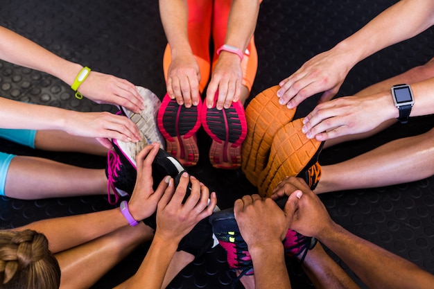 Athletes stretching in gym