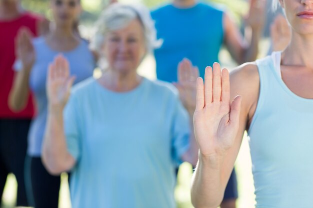 Athletic group showing their hands 