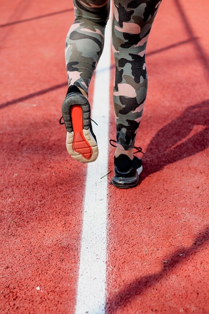 An athletic pair of legs going for a jog