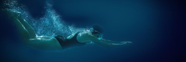 Athletic swimmer training on her own