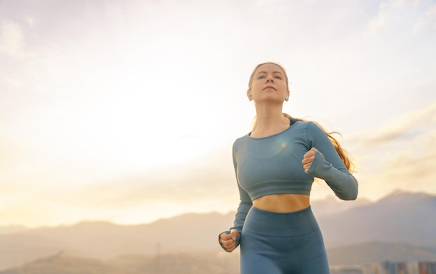 Athletic woman is running