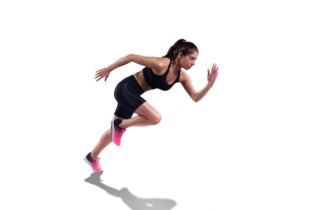 Athletic woman runs fast isolated on white background