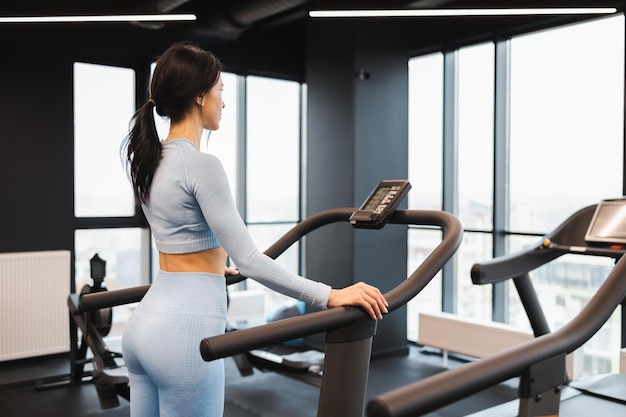Athletic woman on treadmill