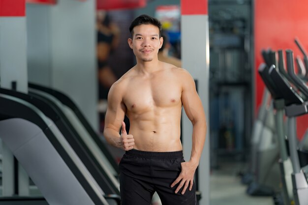 Athletic young man at the gym