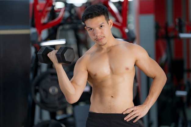 Athletic young man at the gym