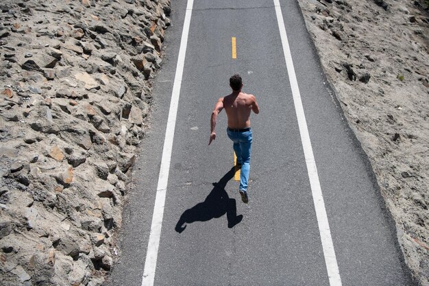 Athletic young man running