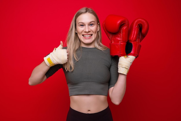 Athletic young woman happy after boxing training