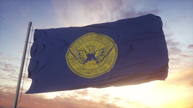 Фото Флаг атланты, джорджия, развевающийся на фоне ветра, неба и солнца. 3d-рендеринг.