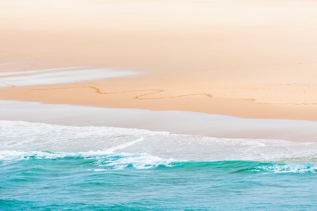 Atlantic ocean coast in Algarve Portugal Beautiful beach with white sand and blue water