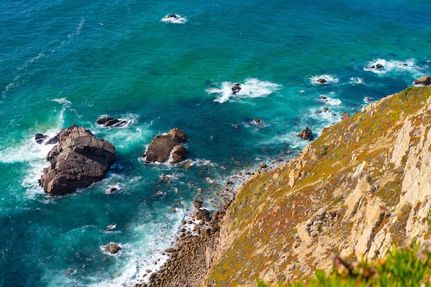 Atlantic ocean view with cliff view of atlantic coast at\
portugal cabo da roca summer day