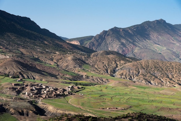 The Atlas Mountains in Morocco Berber village at the bottom of a valley