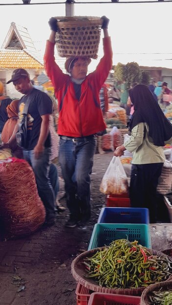 Atmosphere at a traditional vegetable market