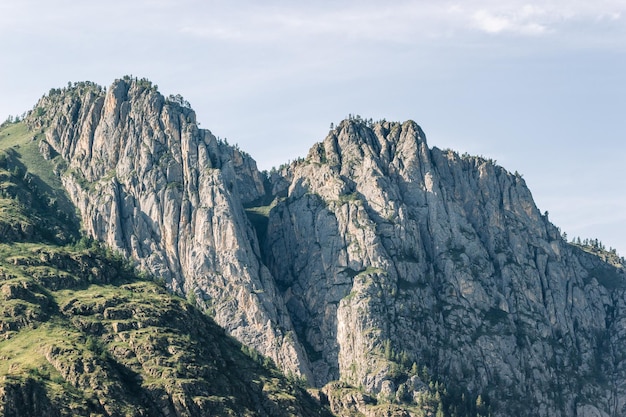 Atmospheric view of beautiful rocks in the rays of the setting sun