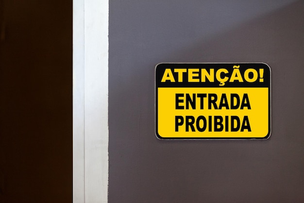 attention entry prohibited sign in portuguese