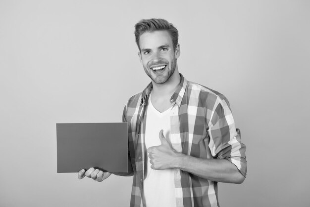 Attention please Social movement Protest Showing poster Hipster bearded man Announcement copy space Paper blank advertisement Barbershop salon Barber fashion Hipster man on yellow background