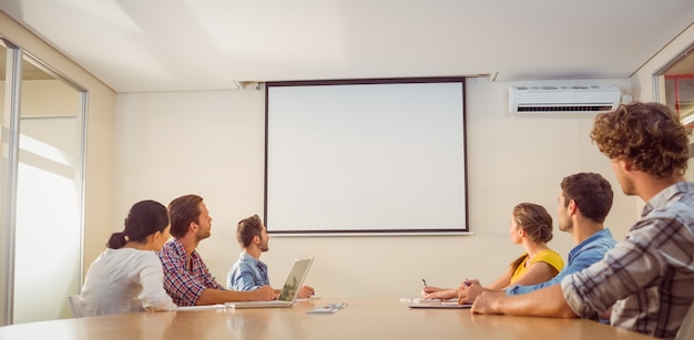 Attentive business team following a presentation