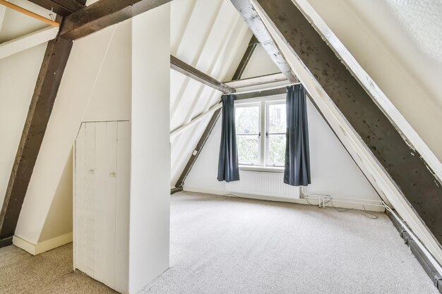 Attic area of the house with a miniature window