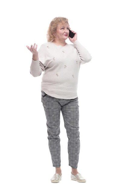 Attractive adult woman with a smartphone isolated on a white