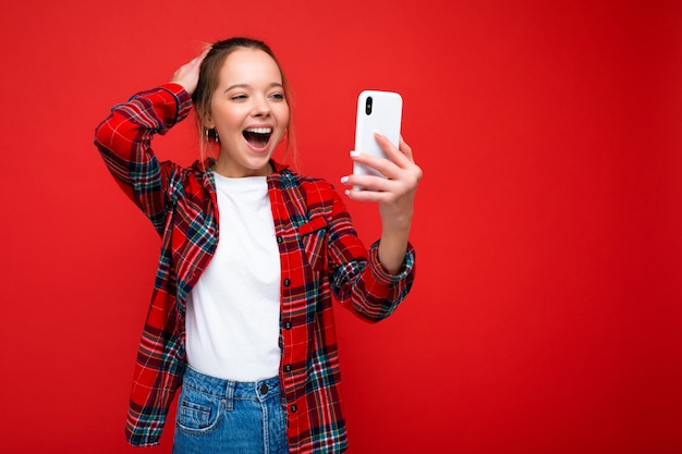 attractive amazed shocked positive good looking young woman wearing casual stylish