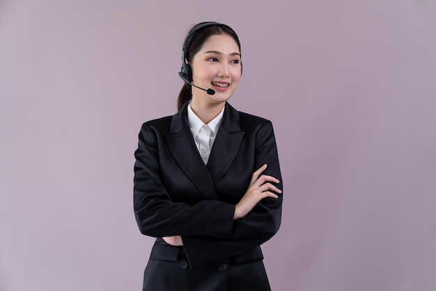 Attractive asian operator with formal suit and headset enthusiastic