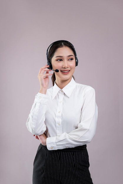 Attractive Asian operator with formal suit and headset Enthusiastic